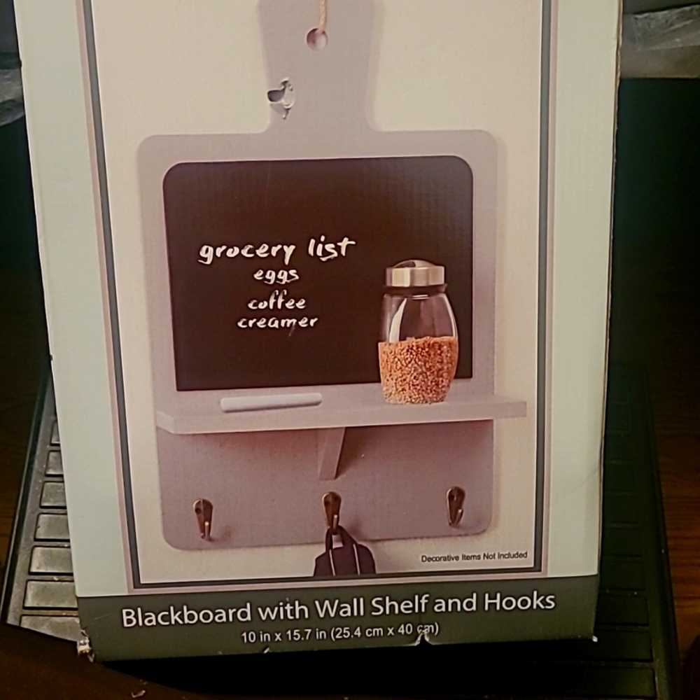 Blackboard with wall shelf